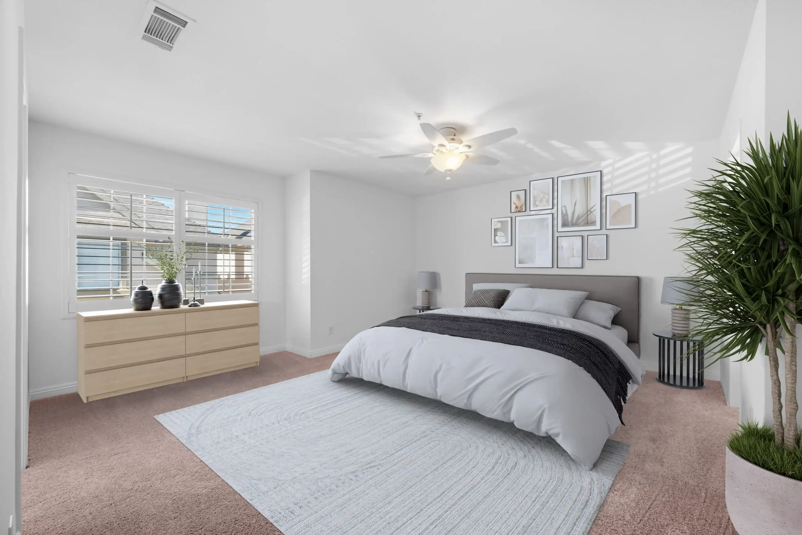 Wildomar real estate photography of a bedroom with a bed, dresser, and a ceiling fan.